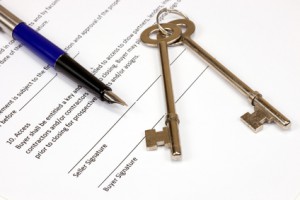 Real Estate Contract Fountain Pen and Keys On an Isolated White Background
